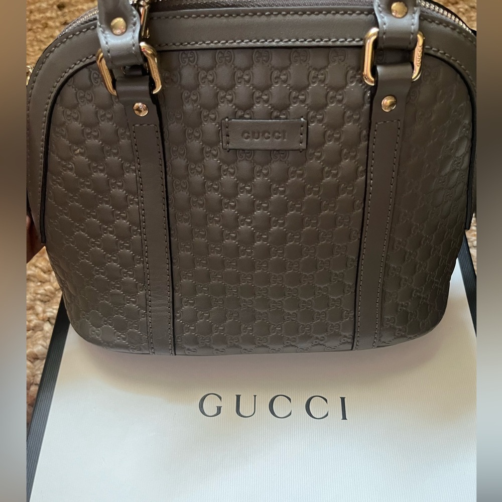 Mini Gucci cross body.
